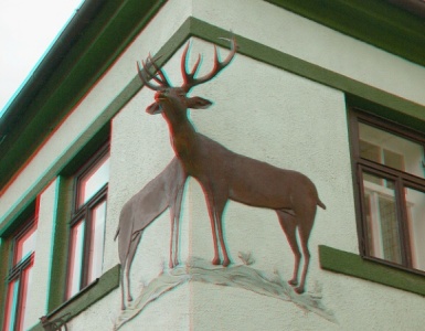 Hlava jelena a dvě jeho těla